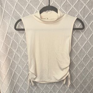 Off white high cut tanktop! Great condition; $10 OBO